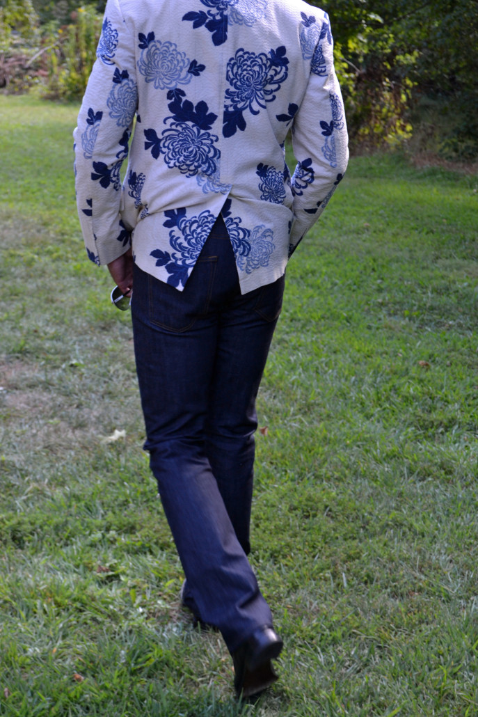 Billy Reid floral blazer & Dstld jeans from the back walking