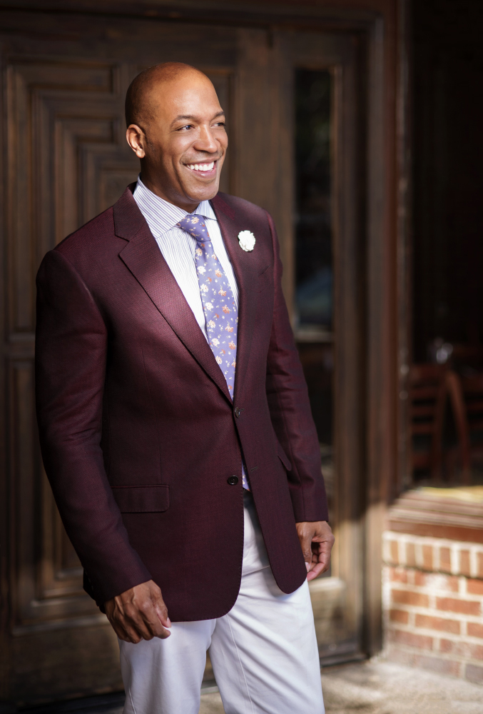 A Dapper Gent standing by door